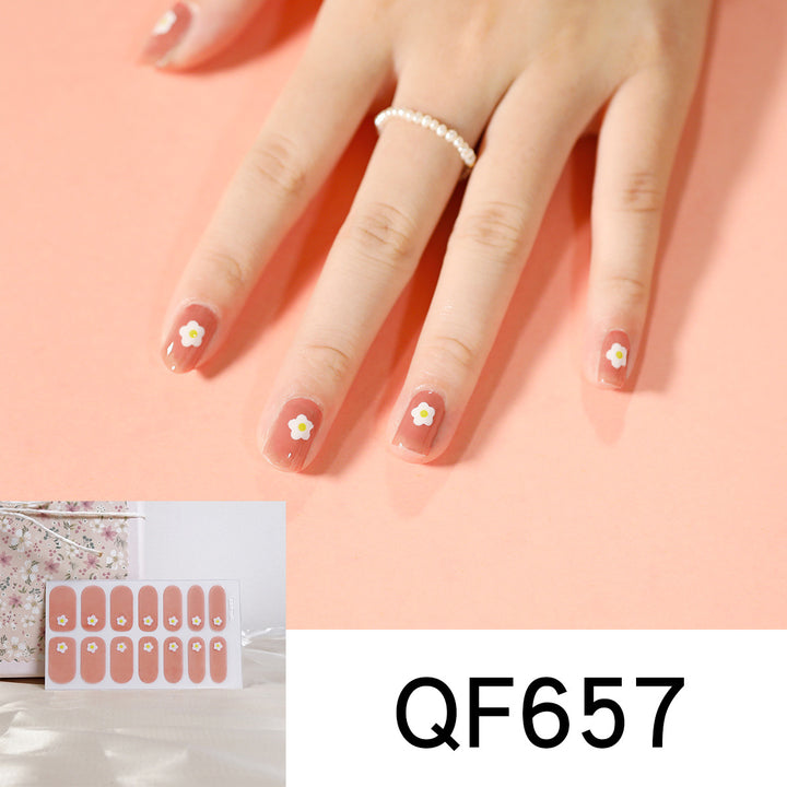 Artificial nail art with heart-shaped designs and soft color gradients Stornfield