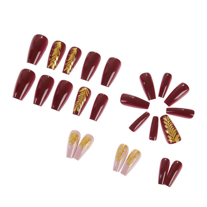 Elegant artificial nails with gold decoration Stornfield