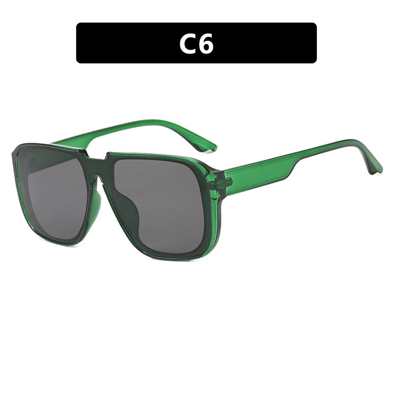 Ladies trendy square sunglasses with transparent green frame and protective UV filter Stornfield