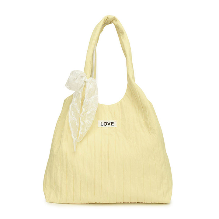 Leisure bag with structured design and playful scarf Stornfield