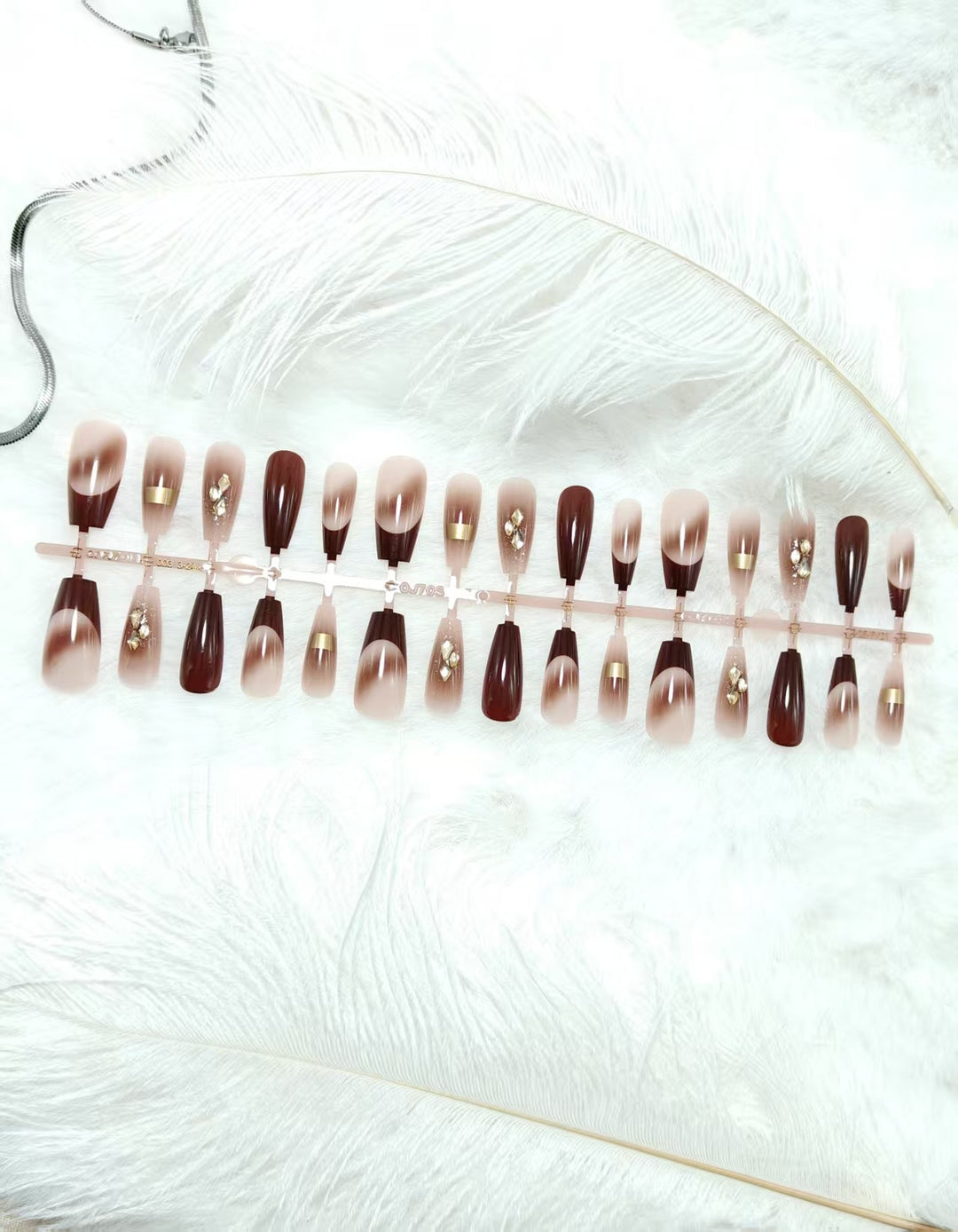 Glamorous artificial nails with elegant accents Stornfield