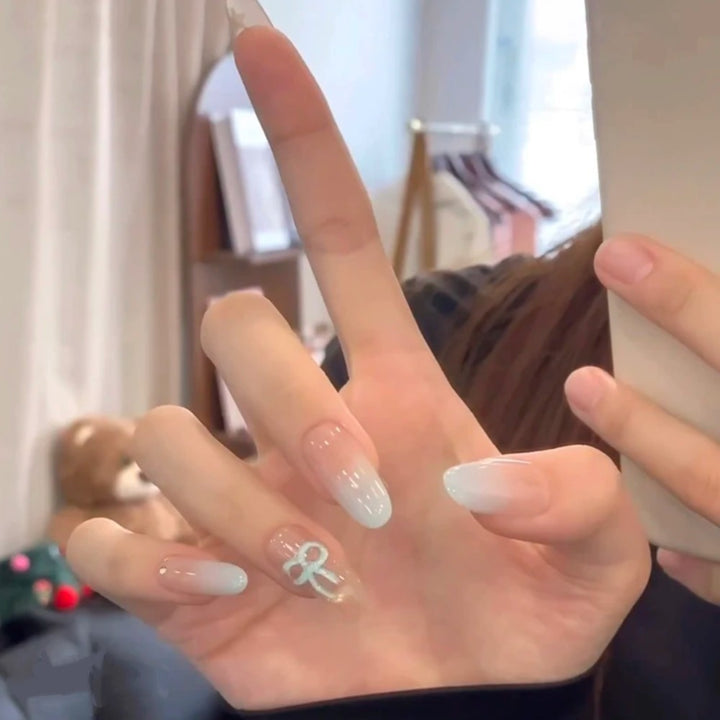Artistic Press-On Nail Set with Glitter and Floral Accents Stornfield