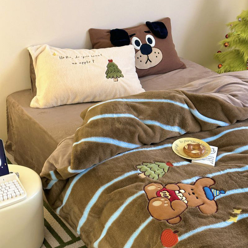 Cozy bedding and cuddly blanket set with embroidered cat appliqués