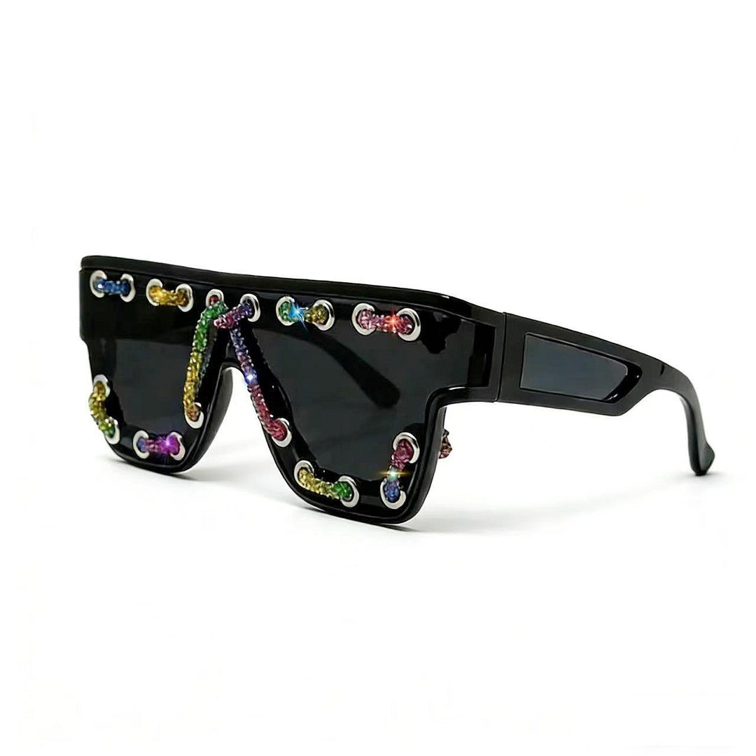 Ladies sunglasses with extravagant design and decorative chain embellishment Stornfield