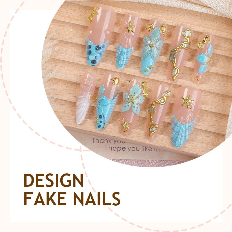 Artificial nail set with maritime motifs and glamorous decorations Stornfield