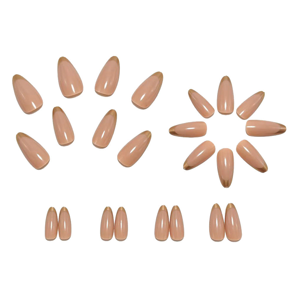 Artificial nails in elegant stiletto design with golden accents Stornfield