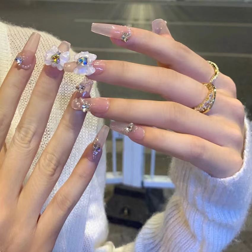 Elegant artificial nails with floral decor and glitter Stornfield