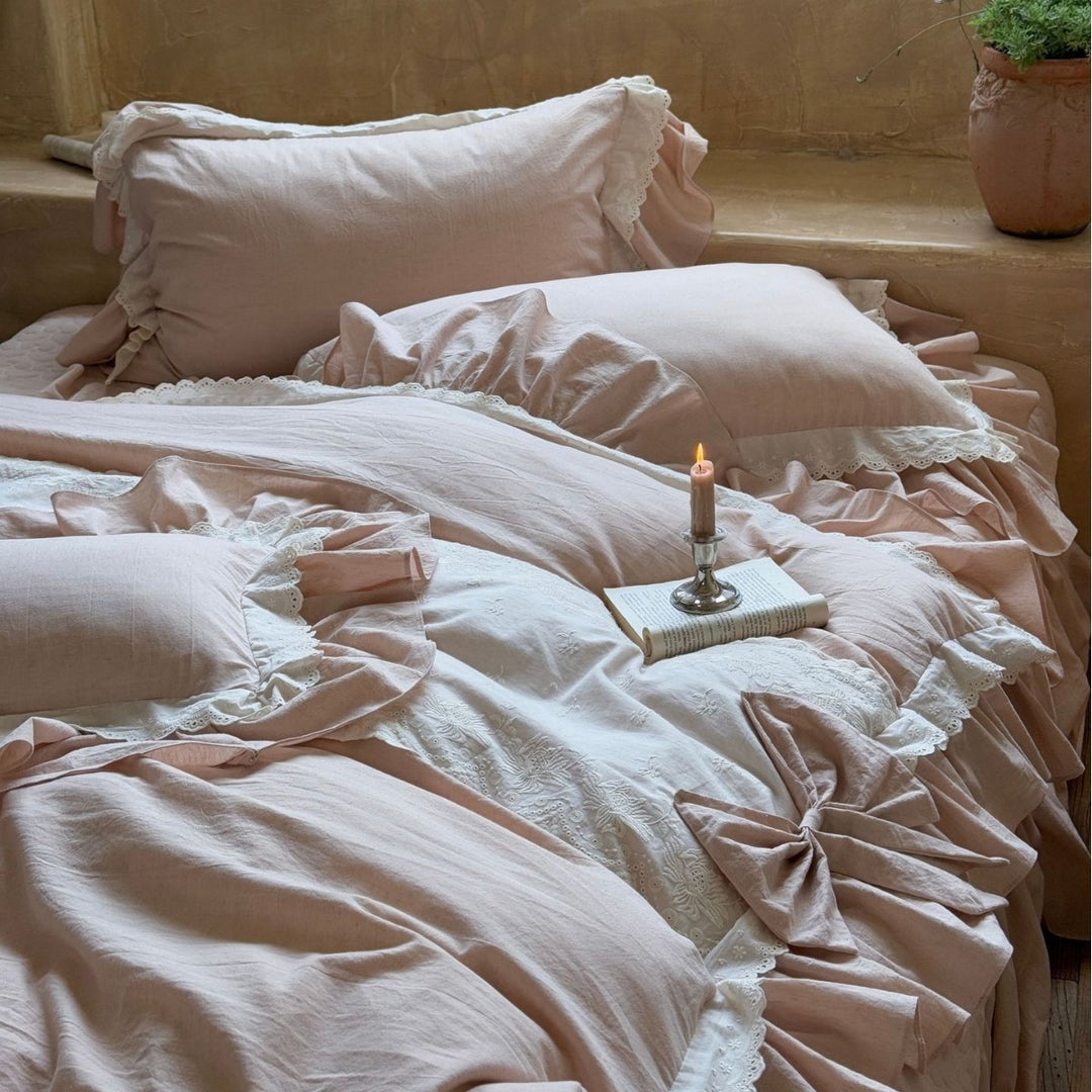 Bedding set in French country house style made of linen-cotton mix with frill and lace application