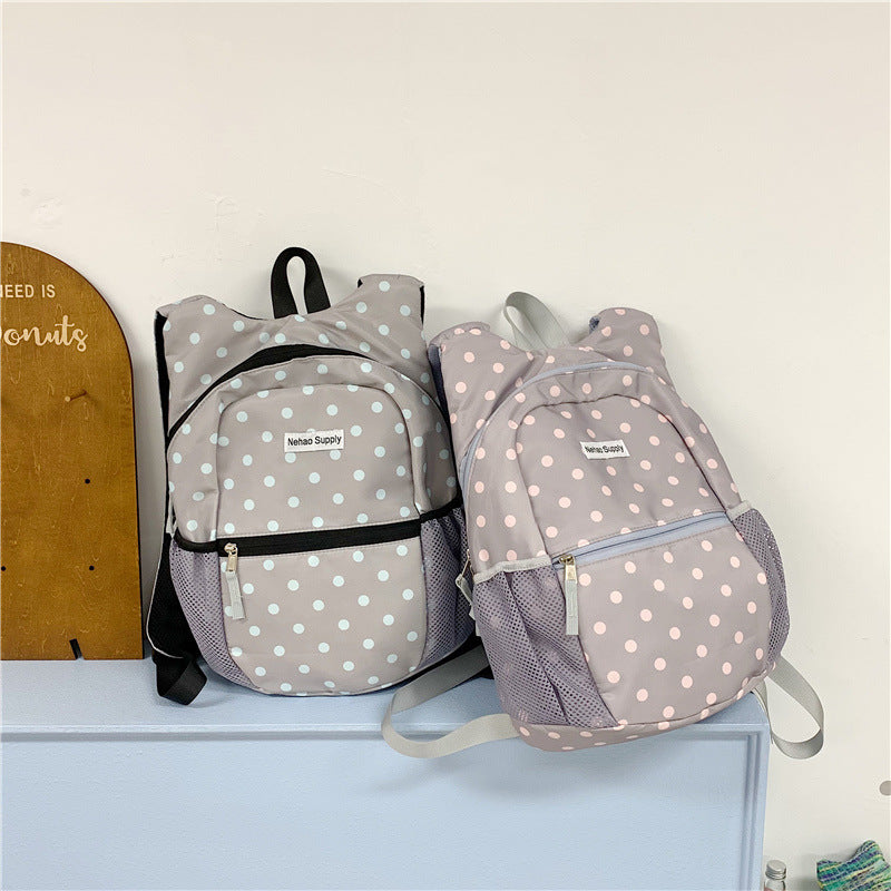 Playful Polka Dot Patterned Backpack Stornfield