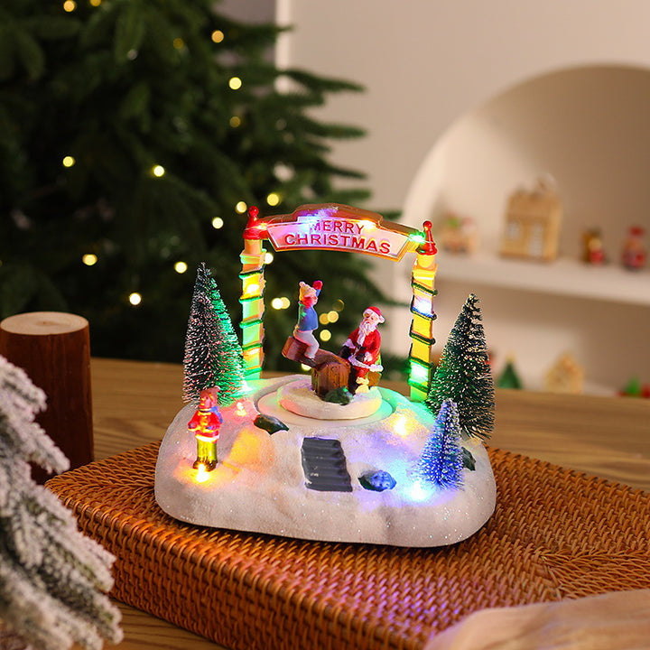 Illuminated Christmas village decoration with moving figures Stornfield