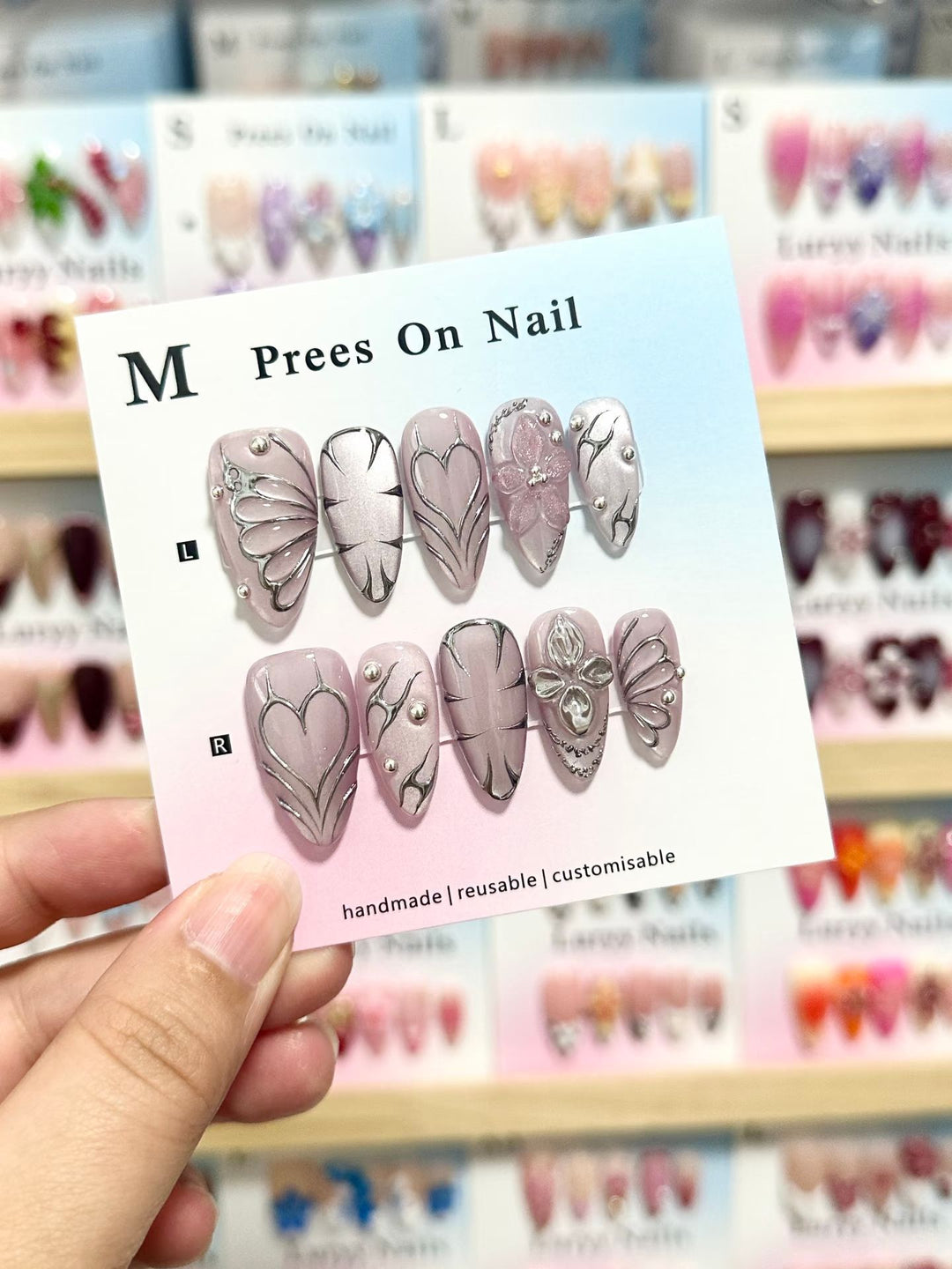 Artistic Press-On Nail Set with Floral and Green Accents