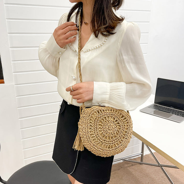 Hand-knotted round shoulder bag made of natural materials Stornfield