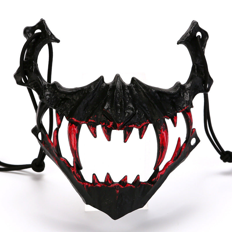 Half-face mask with flashing vampire teeth and adjustable rubber band