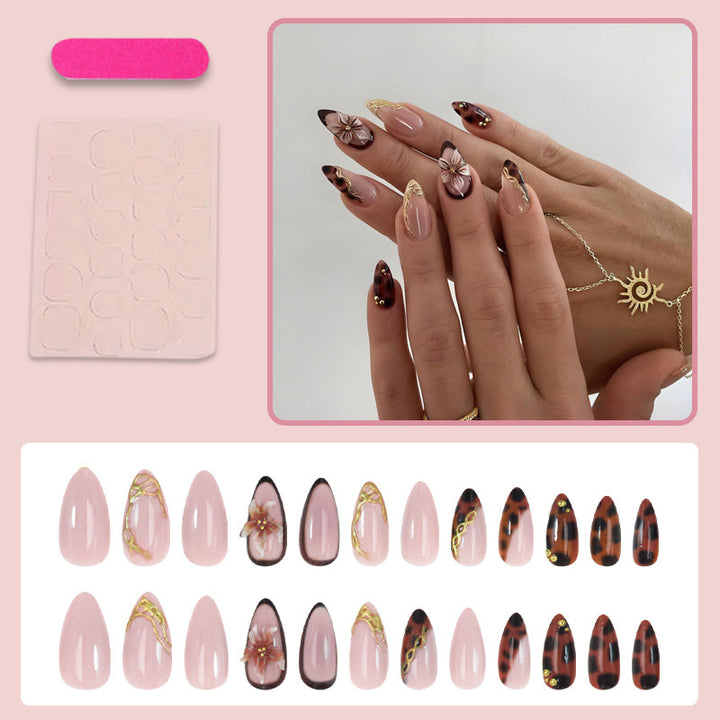 Artificial nail set with elegant floral accents and sparkling design Stornfield