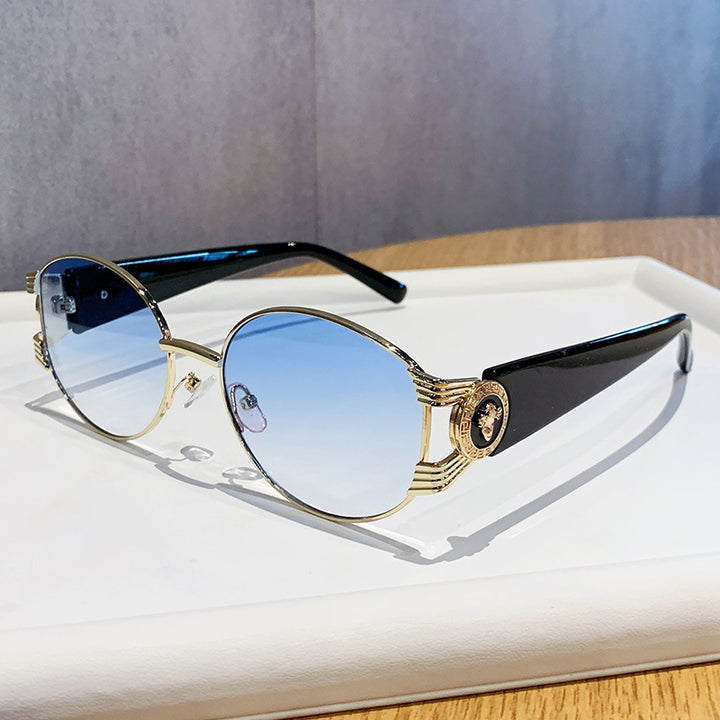 Ladies elegant sunglasses with luxurious metal frame and mirrored lenses Stornfield