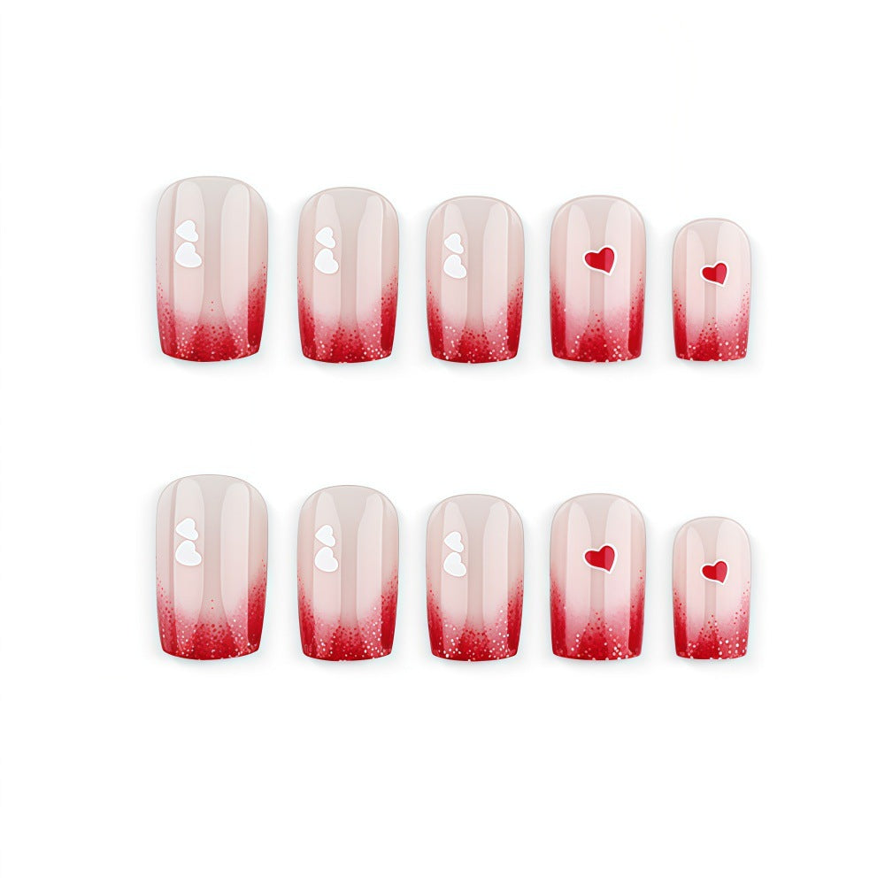 Romantic Nail Art with Heart Motifs Stornfield
