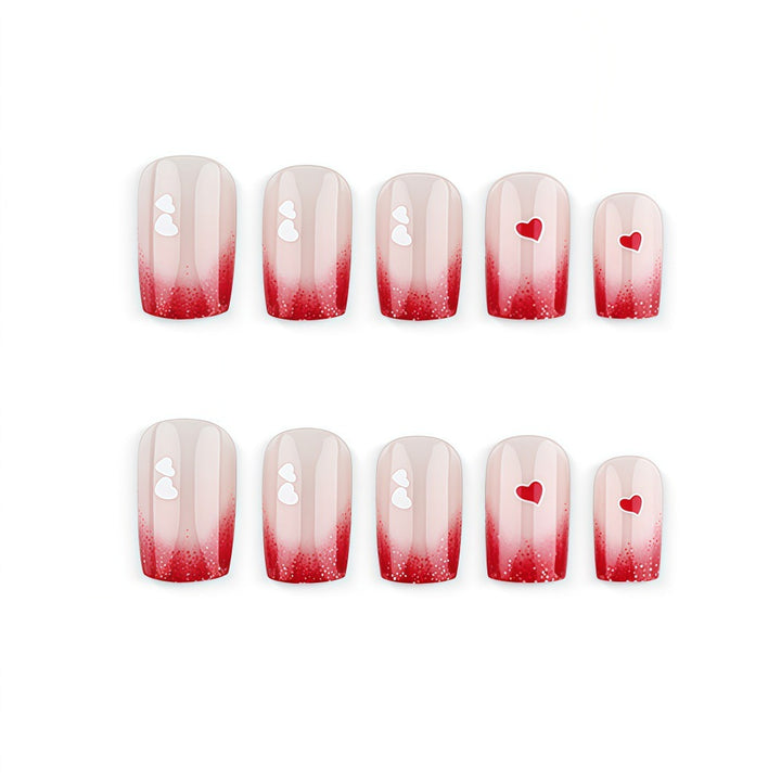 Romantic Nail Art with Heart Motifs Stornfield