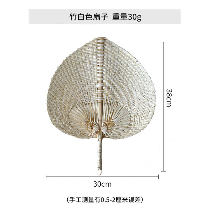 Women hand-woven fan made of natural material Stornfield
