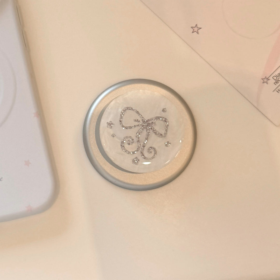 Stylish smartphone finger holder with glitter bow design Stornfield