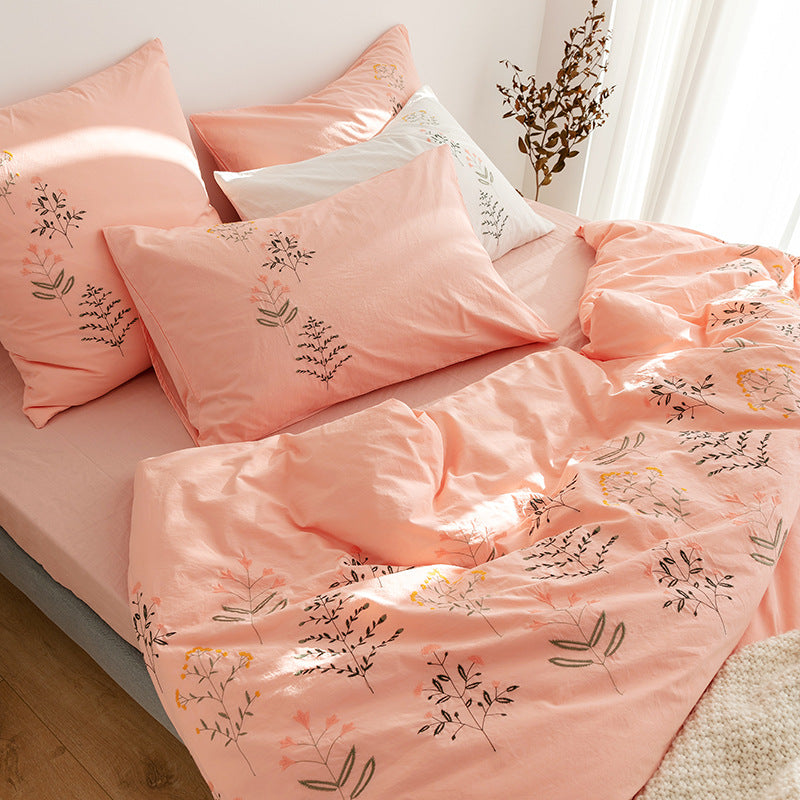 Embroidered cotton muslin bedding set with delicate flower appliqués and extra soft fitted sheet