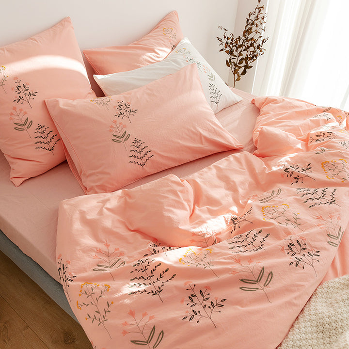 Embroidered cotton muslin bedding set with delicate flower appliqués and extra soft fitted sheet