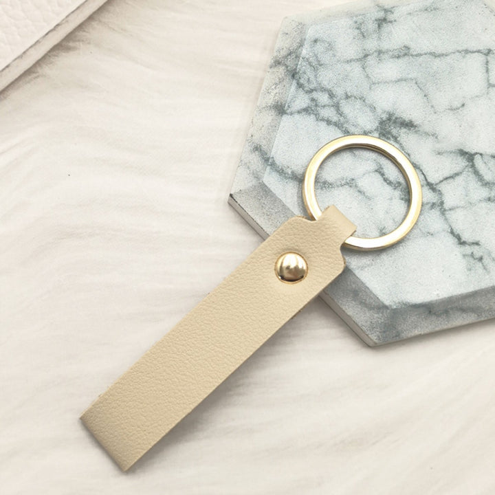 Unisex keychain made of high-quality synthetic leather with elegant metal embellishment Kalsten