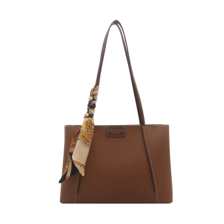 Elegant Leather Tote Bag with Decorative Scarf