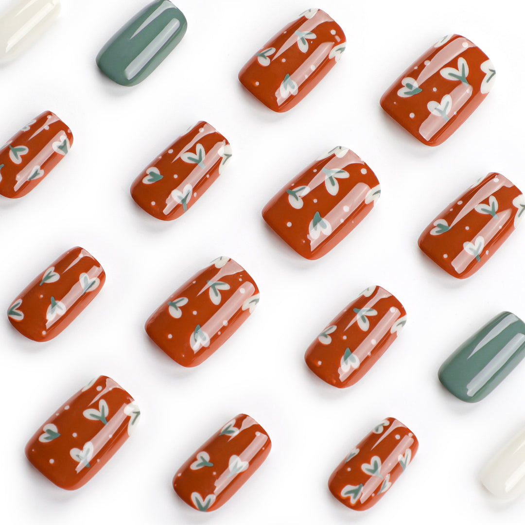 Elegant artificial nails with creative heart decorations Stornfield