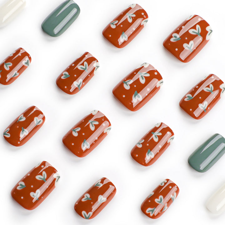 Elegant artificial nails with creative heart decorations Stornfield