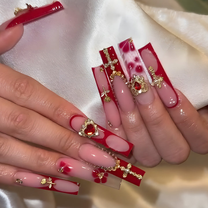 Glamorous Stiletto Press-On Nails with Artistic Gold and Red Accents Stornfield