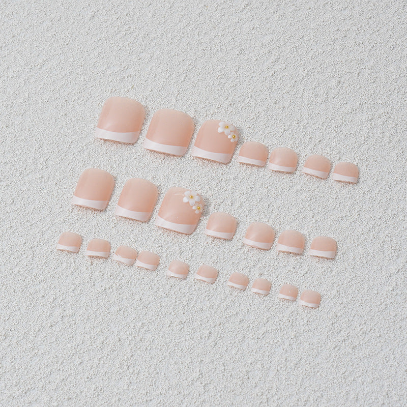 Artificial nail set with elegant flower and French tip designs Stornfield