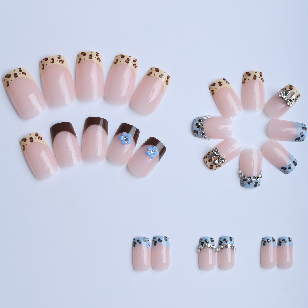 Artificial nails with stylish animal patterns and sparkling accents Stornfield