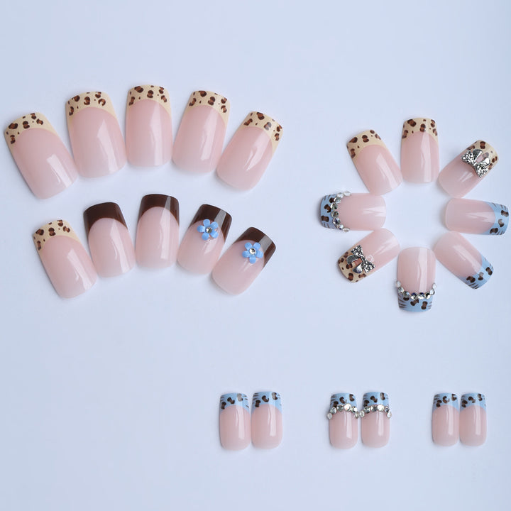 Artificial nails with stylish animal patterns and sparkling accents Stornfield