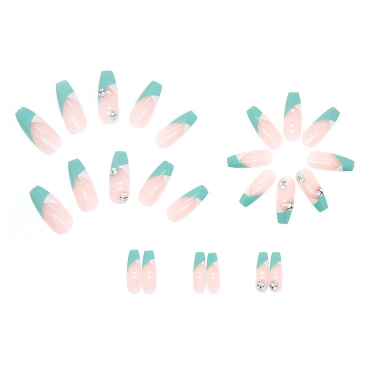 Artificial nail tips with glitter accents and elegant design Stornfield