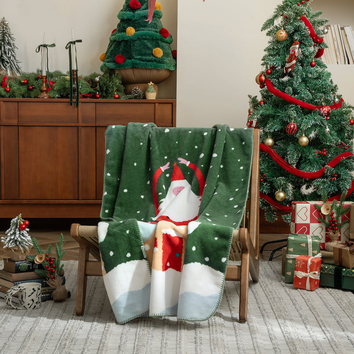 Soft Christmas fleece blanket with gift and gingerbread motif Stornfield