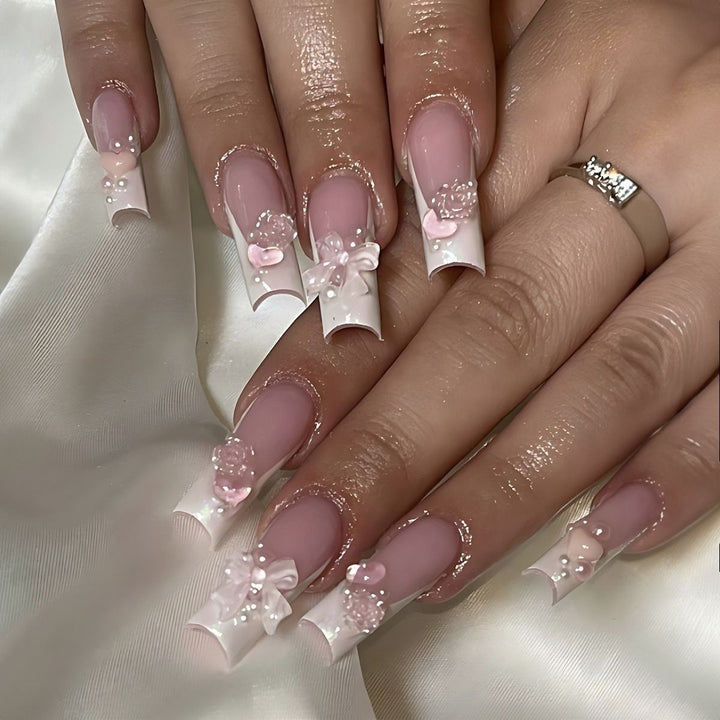 Creative acrylic nail set with delicate pearl and gloss accents Stornfield