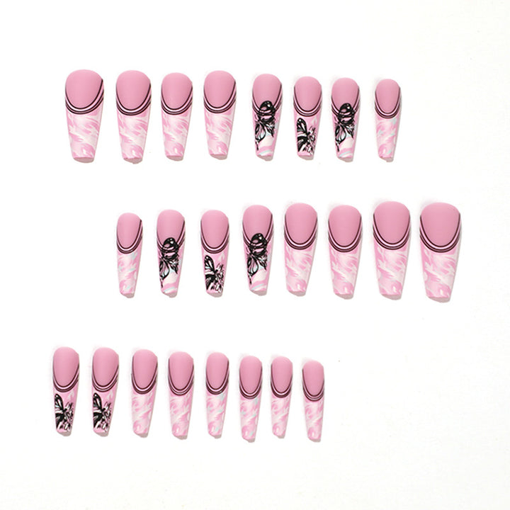 Artificial nail art with delicate butterfly designs Stornfield