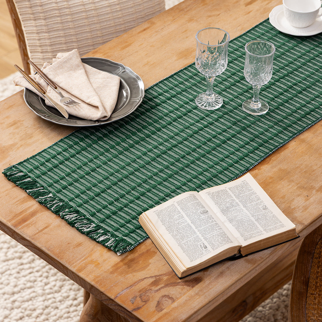 Handwoven plaid made of cotton with structured stripes and fringes