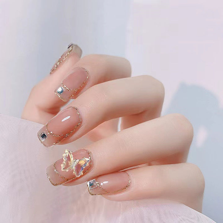 Glamorous artificial nails with delicate rhinestone decorations Stornfield