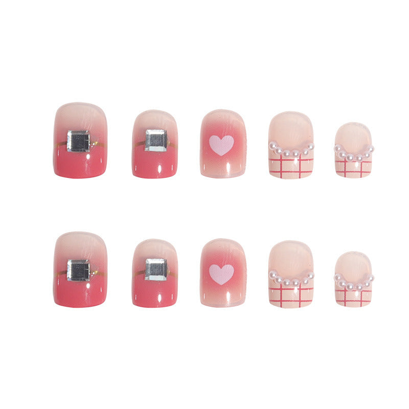 Glamorous Heart-Accented Nail Art Stornfield