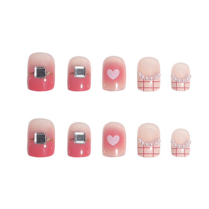 Glamorous Heart-Accented Nail Art Stornfield