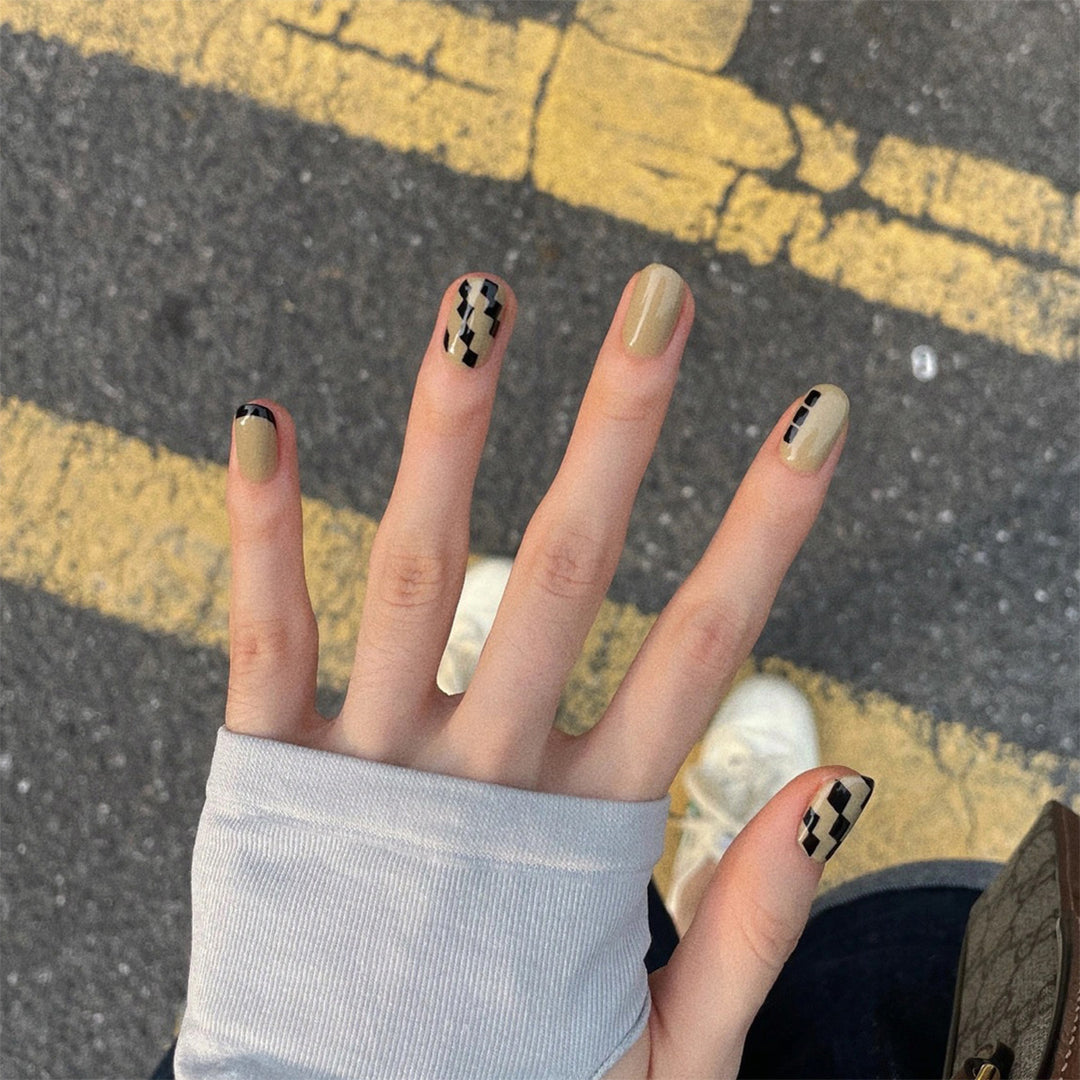 Artful nail extensions with an elegant leaf pattern Stornfield