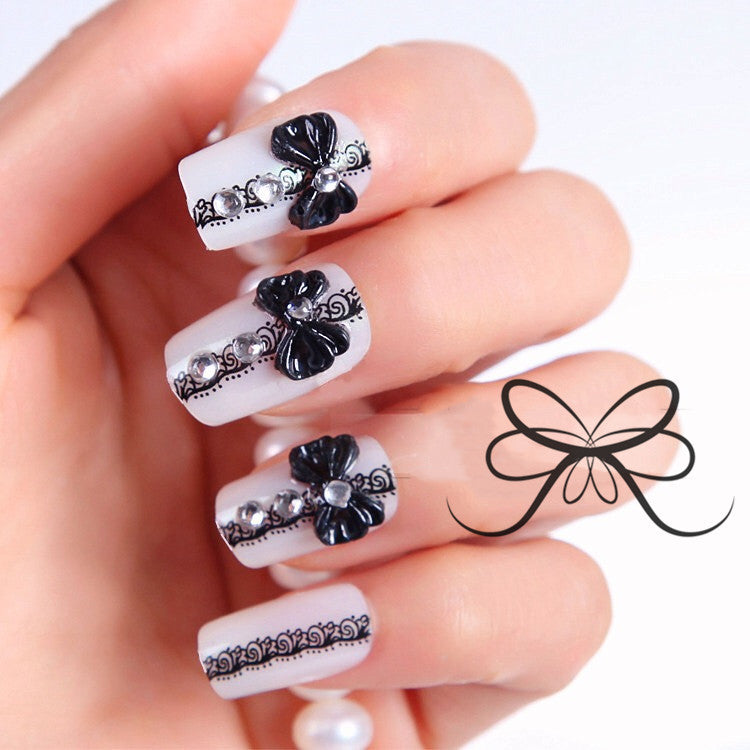 Artificial nails with elegant flower and rhinestone design Stornfield
