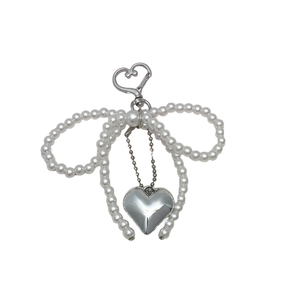 Elegant Pearl Bow Keychain Stornfield