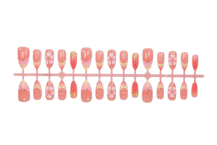 Artificial nail set with elegant floral decorations and luxurious shine Stornfield