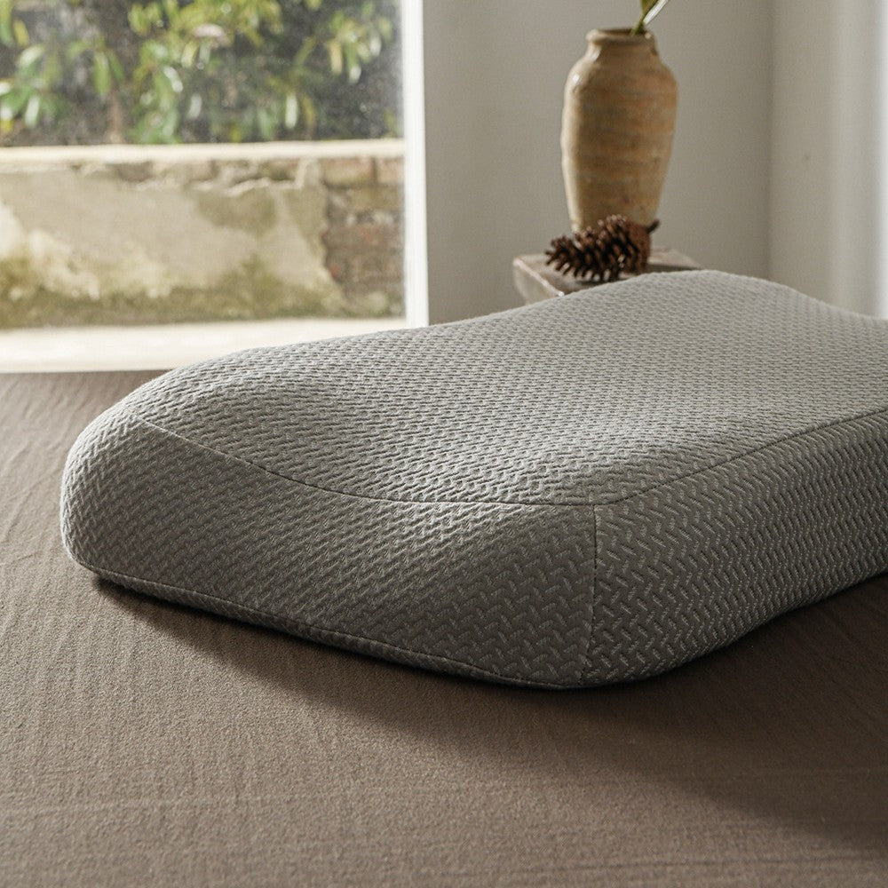 Ergonomic neck support pillow with gel cushioning