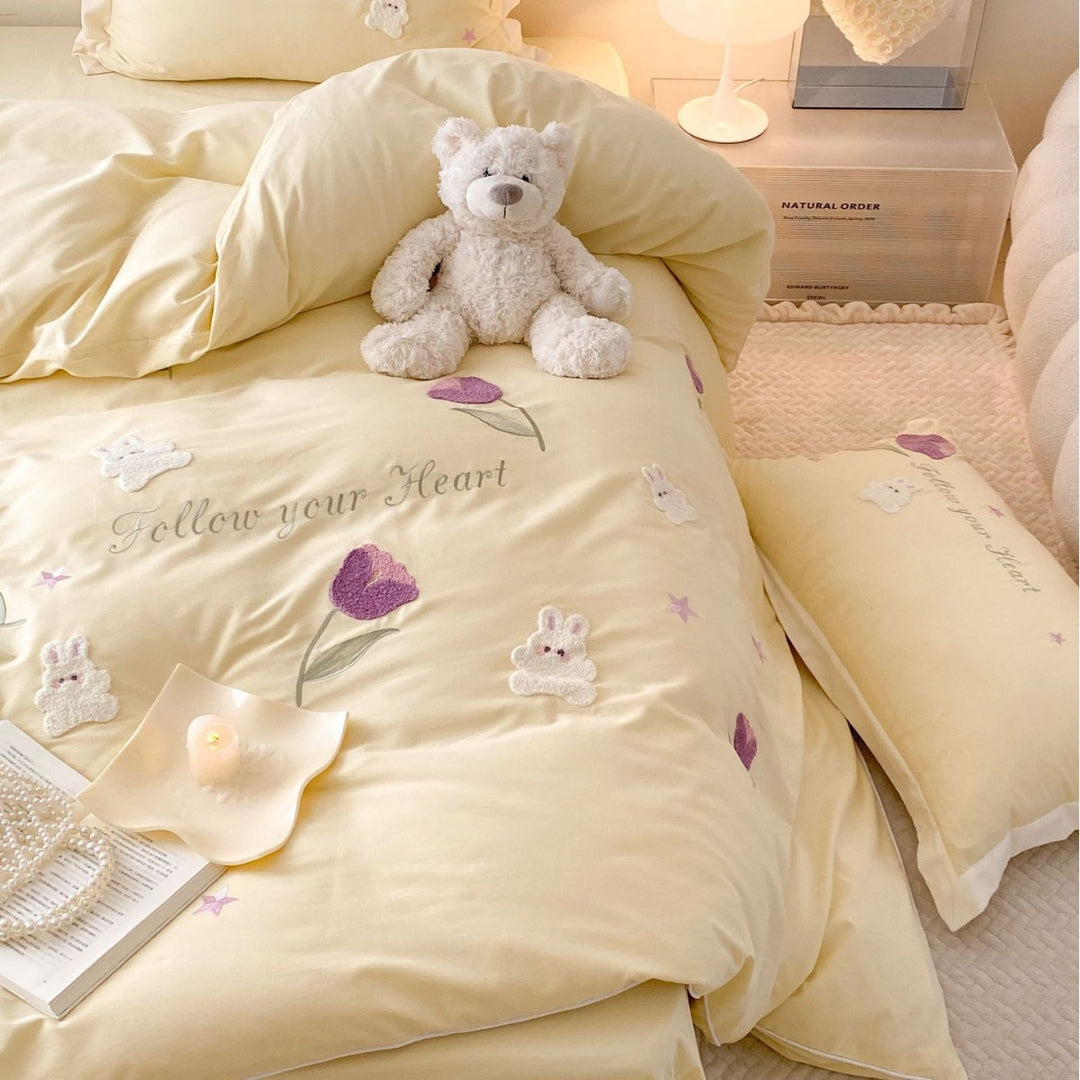 Romantic cotton satin bedding set with embroidered rabbit and flower appliqués