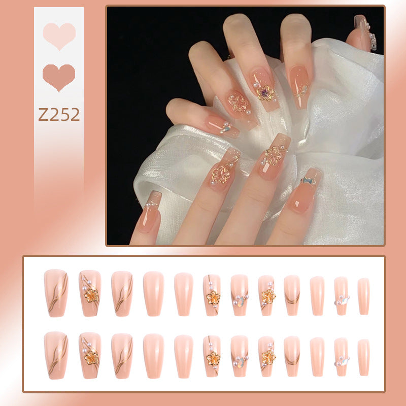 Artificial nail set with elegant floral and luxurious decorations Stornfield