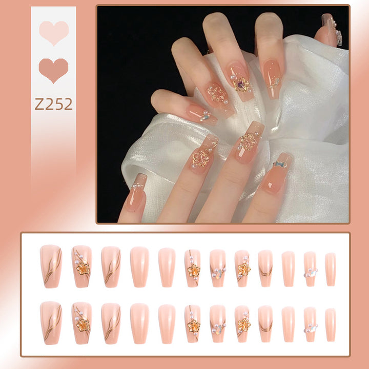 Artificial nail set with elegant floral and luxurious decorations Stornfield