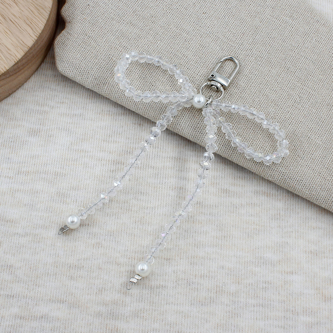 Elegant Beaded Bow Brooch Stornfield
